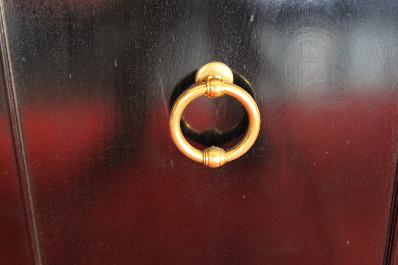 English black lacquered sideboard with brass handles, 1940s